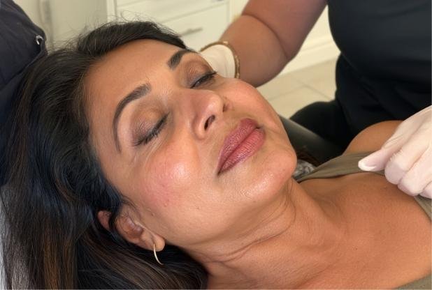 Woman with volume loss due to ageing waiting for dermal filler treatment at Sculpt by Kelly Swann in Beaconsfield